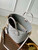 LV M12088 Louis Vuitton Blossom PM Mahina Leather Bag Brume Gray