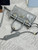 Prada 1BA486 Bonnie leather mini handbag Gray