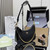 Prada Re-Edition Saffiano leather mini-bag 1BC204 Black