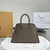 The Row W1255L72 Calfskin Margaux 15 Air buckled textured-leather tote T10995