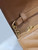 YSL 377828 Classic Cassandre chain wallet in grain de Poudre leather Brown