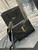 YSL Cassandre Matelassé Flap pouch in Patent leather 617662 V Black