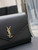 YSL 617662 Cassandre Matelassé Flap pouch in Black leather