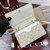 Gucci GG Emblem wallet with leather strap 820688 Biege & White