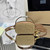 Prada 1NR025 Crochet and leather mini-pouch Natural