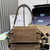 Prada Explore medium suede shoulder bag with flap 1BD394 Brown