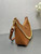Prada Re-Edition leather mini-bag 1BC204 Brown