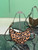 Prada 1BC194 Prada Arqué printed leather shoulder bag Honey