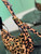 Prada 1BC194 Prada Arqué printed leather shoulder bag Honey