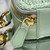 Prada 1NR025 Crochet and leather mini-pouch Green