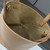 Loewe A657V25X01  Mini Puzzle Fold tote in shiny calfskin Apricot Yellow