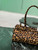 Prada 1BA426 Medium printed leather handbag Honey