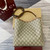 Gucci 815103 GG Emblem bucket bag Beige and dark brown