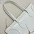 CELINE FLAT LUGGAGE IN GLOSSY CALFSKIN 123963GW4 White