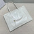 CELINE FLAT LUGGAGE IN GLOSSY CALFSKIN 123963GW4 White