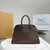 The Row W1255L72 Calfskin Margaux 15 Air buckled textured-leather tote T10997