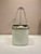 Prada 1BE085 Buckle leather bucket bag with jeweled belt White