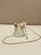 Prada 1NR016 patent leather mini pouch White