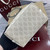 Gucci 815118 GG Emblem small bucket bag beige and white fabric