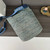 Loewe Slit pochette bag in raffia and calfskin 32824W10 Blue