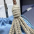 Prada Noué medium cotton macramé bag 1BC111 Blue