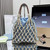 Prada Noué medium cotton macramé bag 1BC111 Blue