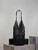 YSL 821911 supple bucket in wood beads Black