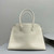 The Row THR116945 Suede Soft Margaux 17 Top Handle Bag T11005
