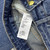 Chanel Women Double C logo print flared denim trousers Jeans C58813