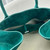 The Row W1255L72 Suede Soft Margaux 15 Air buckled tote T10999