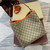 Gucci 815103 GG Emblem bucket bag Beige and Orange GG fabric