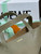 Loewe Mini Puzzle Fold tote in shiny calfskin A657V25X01 Green