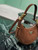 Prada 1BC194 Prada Arqué suede leather shoulder bag Dark Brown