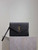 YSL Cassandre Matelassé Flap pouch in grain de Poudre leather 617662 V Black
