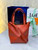 Loewe Mini Puzzle Fold tote in shiny calfskin A657V25X01 Orange Red