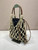 Prada Noué medium cotton macramé bag 1BC111 Black