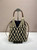 Prada Noué medium cotton macramé bag 1BC111 Black