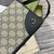 Gucci GG Emblem wallet with leather strap 820688 Biege & Black