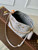 LV M12125 Louis Vuitton Bella Mahina Leather Bucket Bag Brume Gray