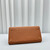 The Row W1255L72 Calfskin Margaux 15 Air buckled textured-leather tote T10991