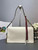 Prada 1BD378 Soft Sound large leather shoulder bag with charms White