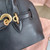 MiuMiu 5BB169 Aventure nappa leather top-handle bag Black