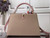 LV M57523 Louis Vuitton Capucines MM Handbag Gray Pink