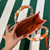 Prada 1BA354 Small Prada Symbole jacquard fabric handbag Orange White