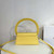Jacquemus 213BA003 Le sac Rond Circle purse Yellow