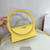 Jacquemus 213BA003 Le sac Rond Circle purse Yellow