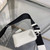 Prada Leather Prada Triangle shoulder bag 1BH190 White