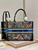 Dior M1296 Medium Book Tote D-Constellation embroidery in shades of blue
