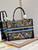 Dior M1296 Medium Book Tote D-Constellation embroidery in shades of blue