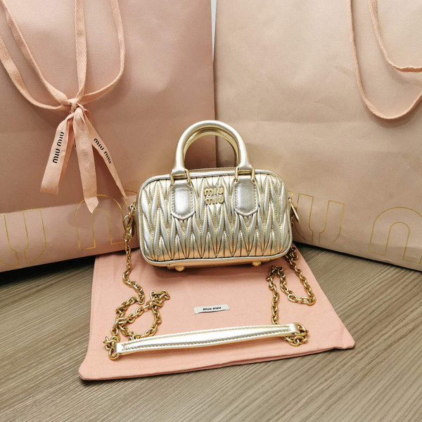 MiuMiu 5BP077 Matelassé nappa leather top-handle mini-bag Pyrite